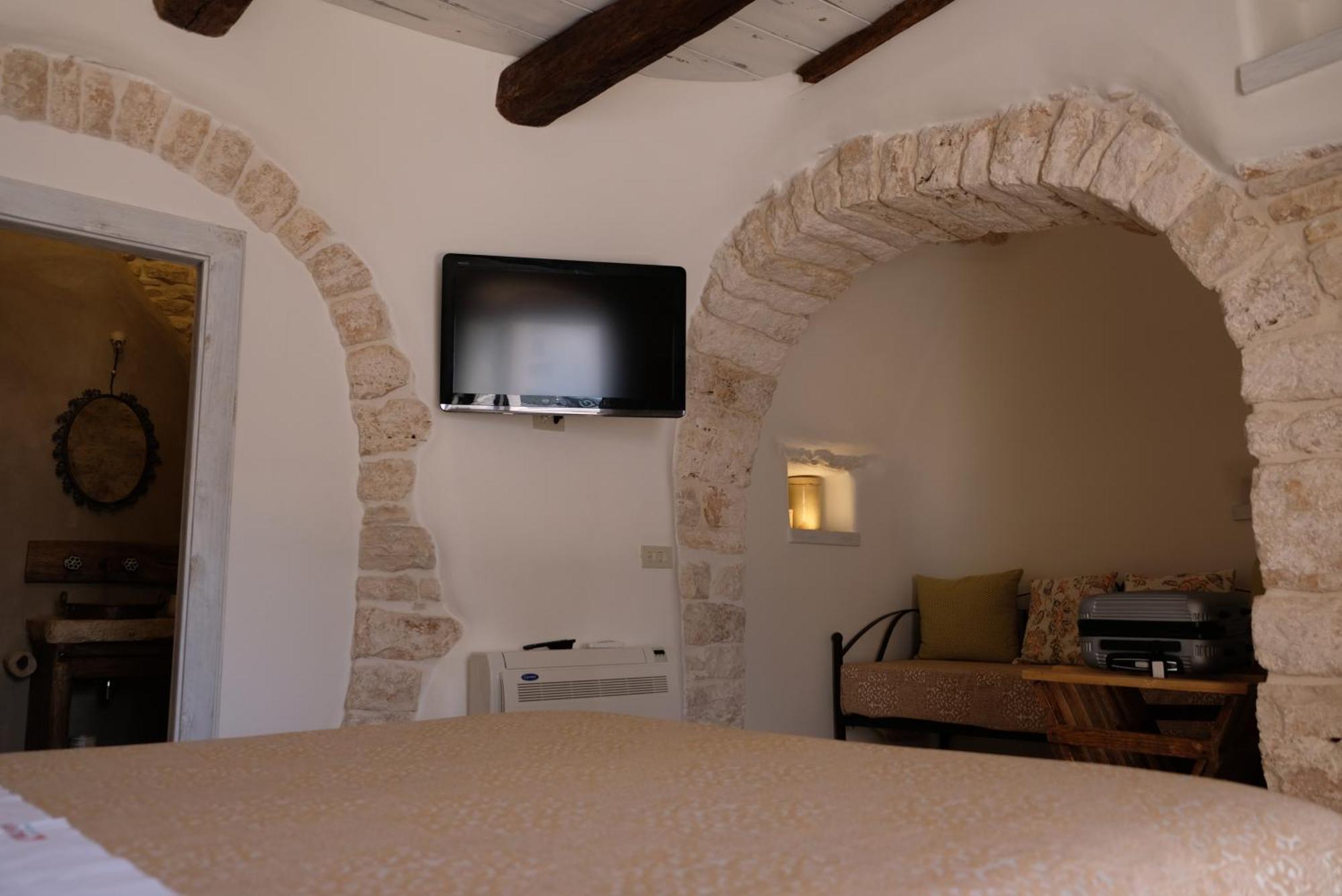 Trulli Holiday Albergo Diffuso Альберобелло Экстерьер фото